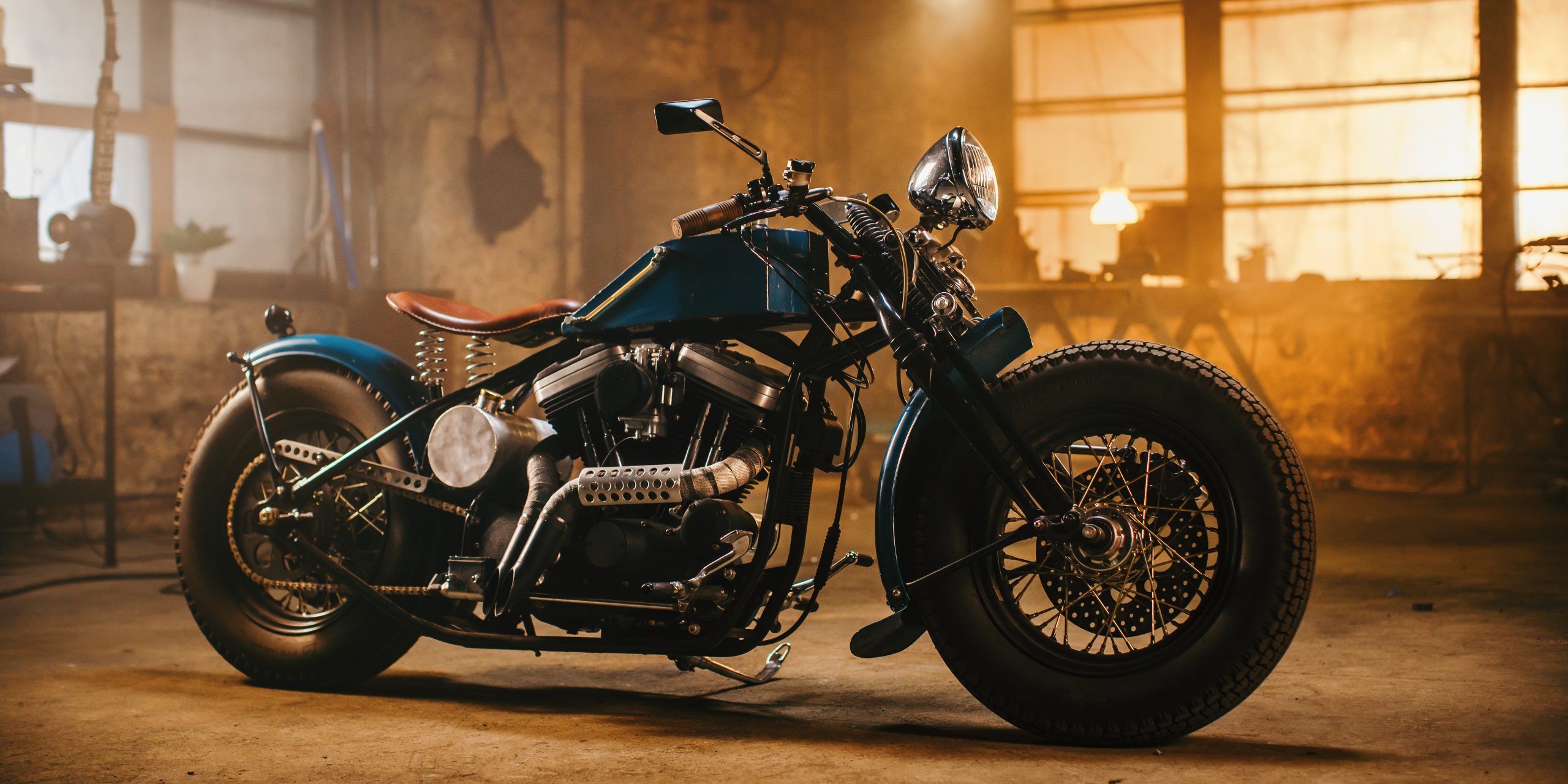 Custom Bobber Motorbike Standing In An Authentic Creative Worksh